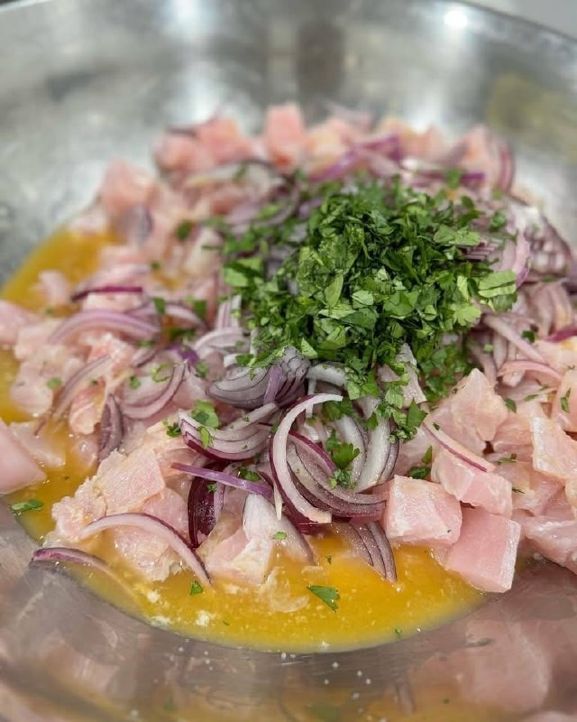 Fresh ceviche with red onion and cilantro